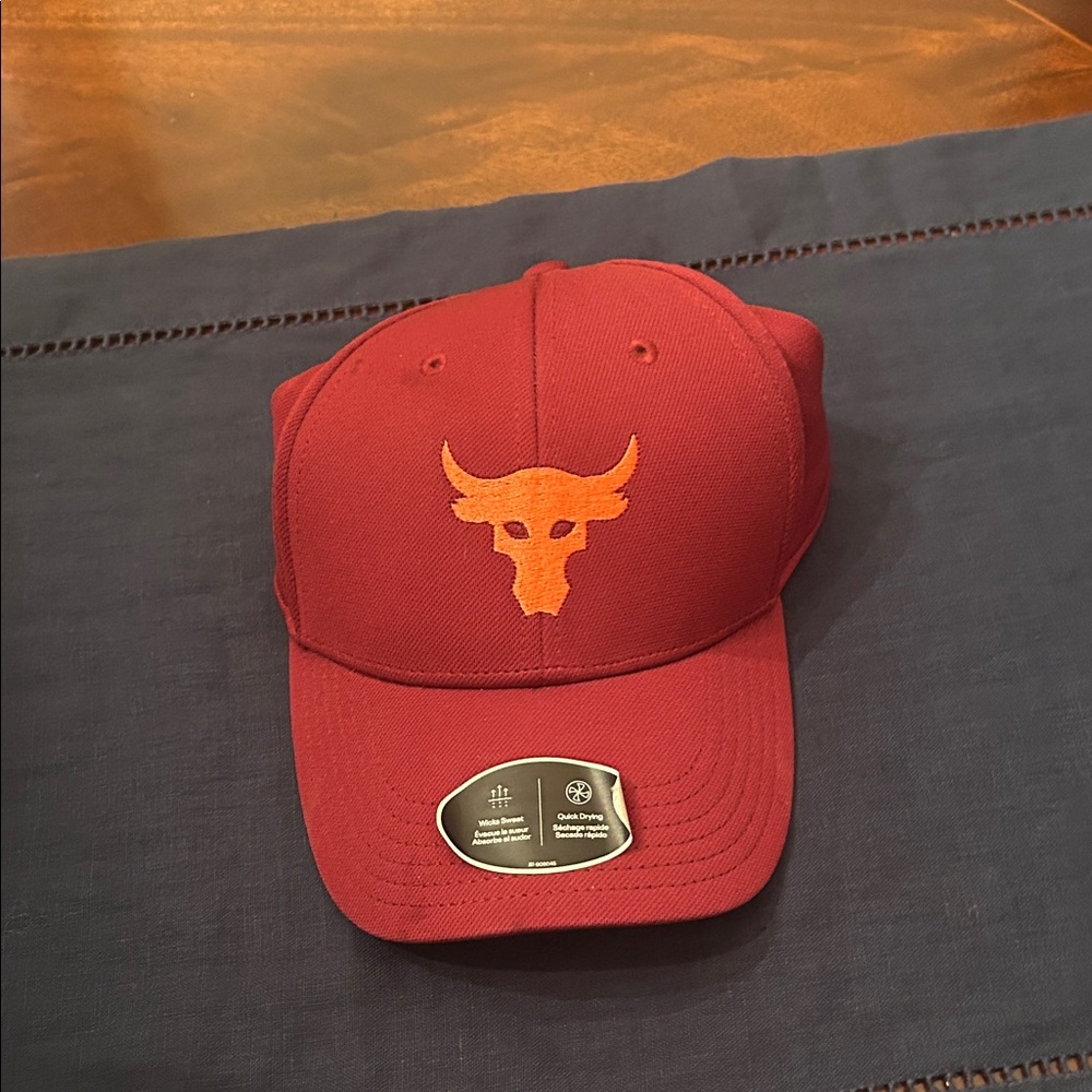 Project Rock Woman’s Cap with Orange Bull Logo